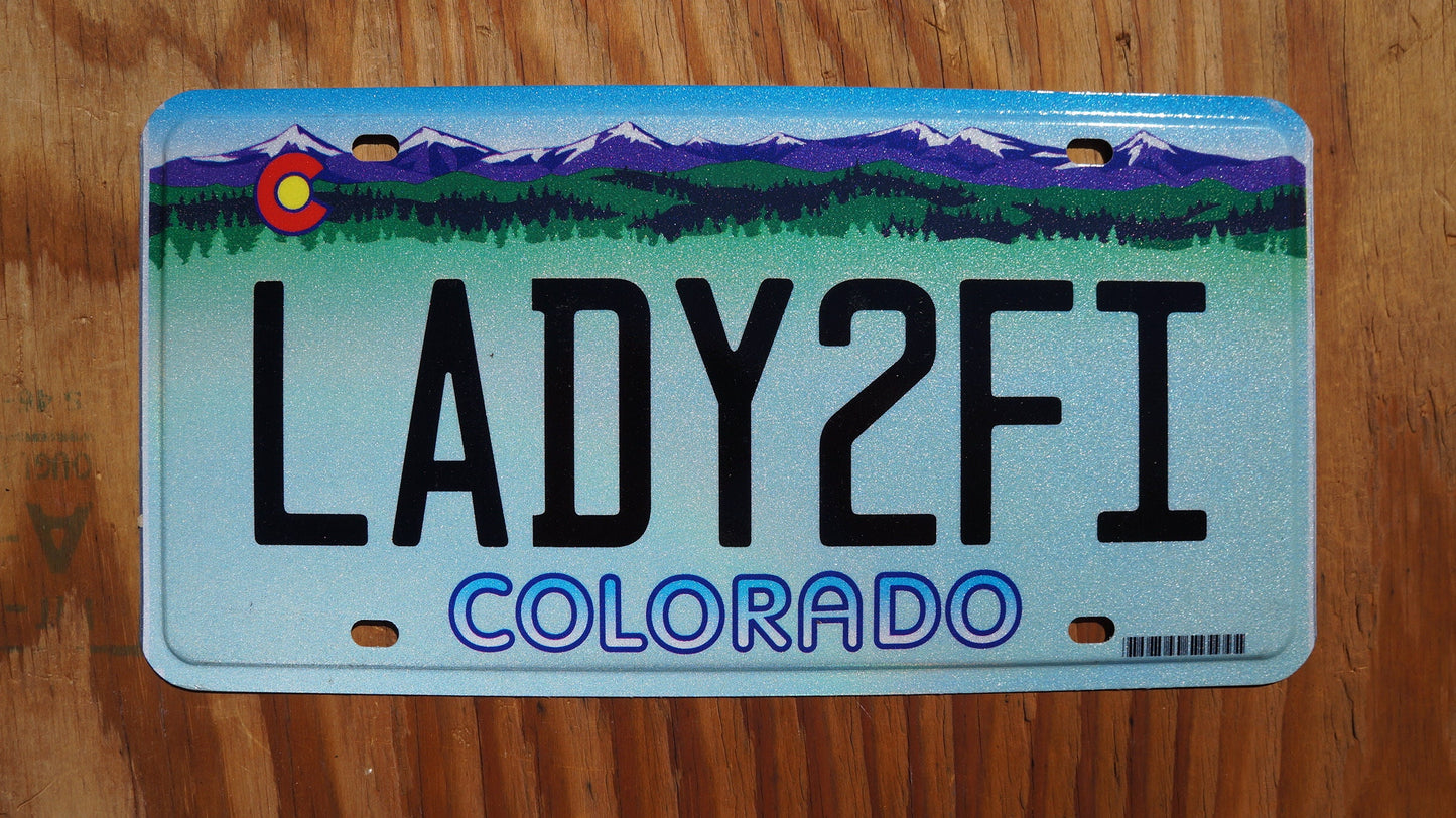Colorado LADY to FI Vanity Purple Mountains License Plate - LADY2FI