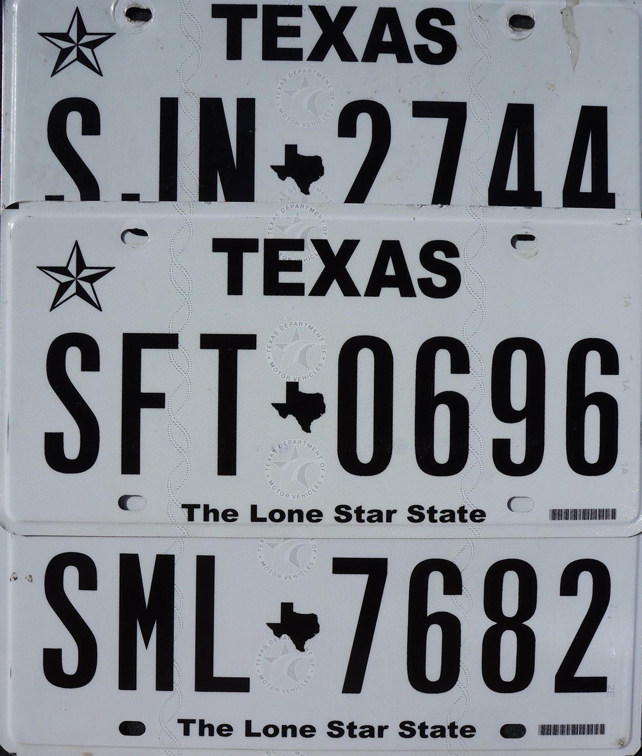 Authentic Texas License Plate: Black on White, Lone Star State Logo