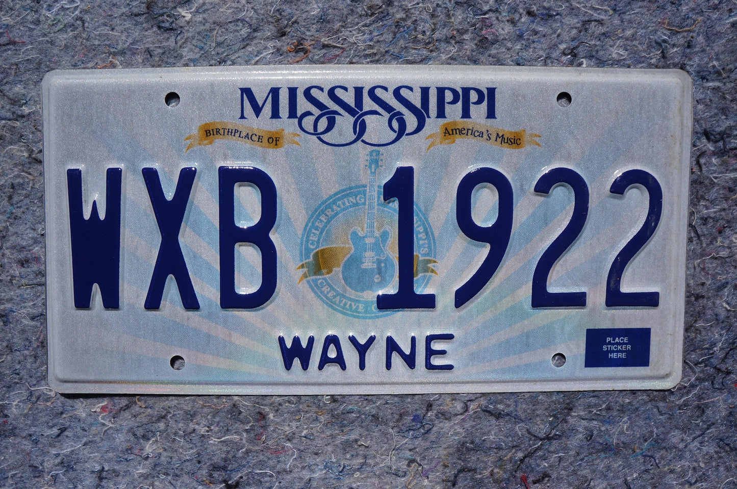 Mississippi Embossed Guitar License Plate # WXB 1922