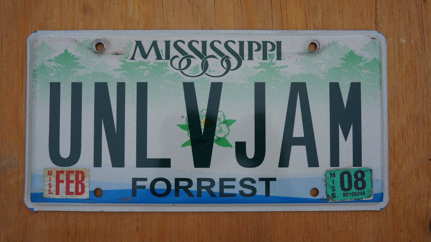 2008 Mississippi FORREST County Magnolia Flower Graphic License Plate # UNL V JAM