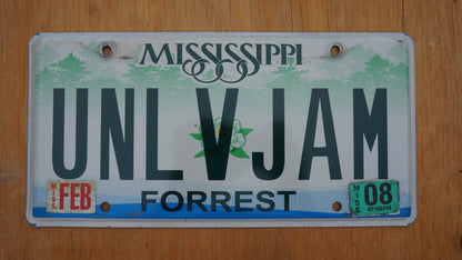 2008 Mississippi FORREST County Magnolia Flower Graphic License Plate # UNL V JAM