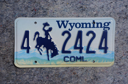 Wyoming Cowboy & Horse Blue License Plate # 2424