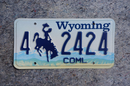 Wyoming Cowboy & Horse Blue License Plate # 2424