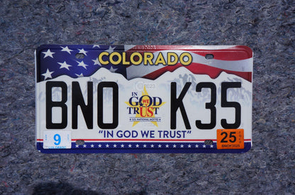 Colorado In GOD WE TRUST Graphic Flag License Plate