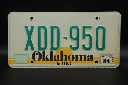 1984 Oklahoma IS OK! Yellow Sun Vintage License Plate # XDD - 950