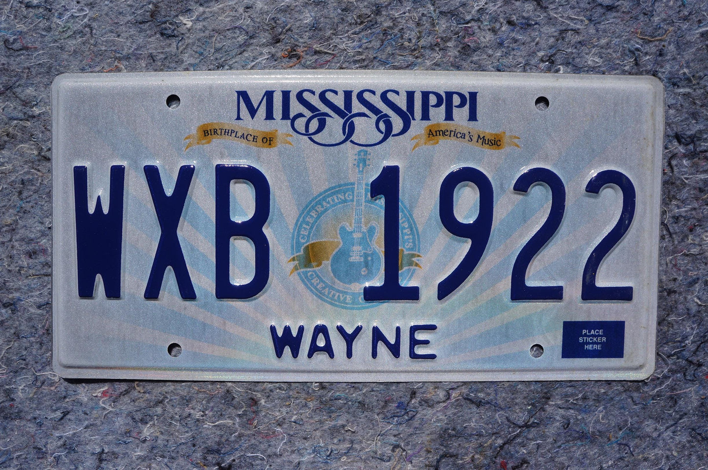 Mississippi Embossed Guitar License Plate # WXB 1922