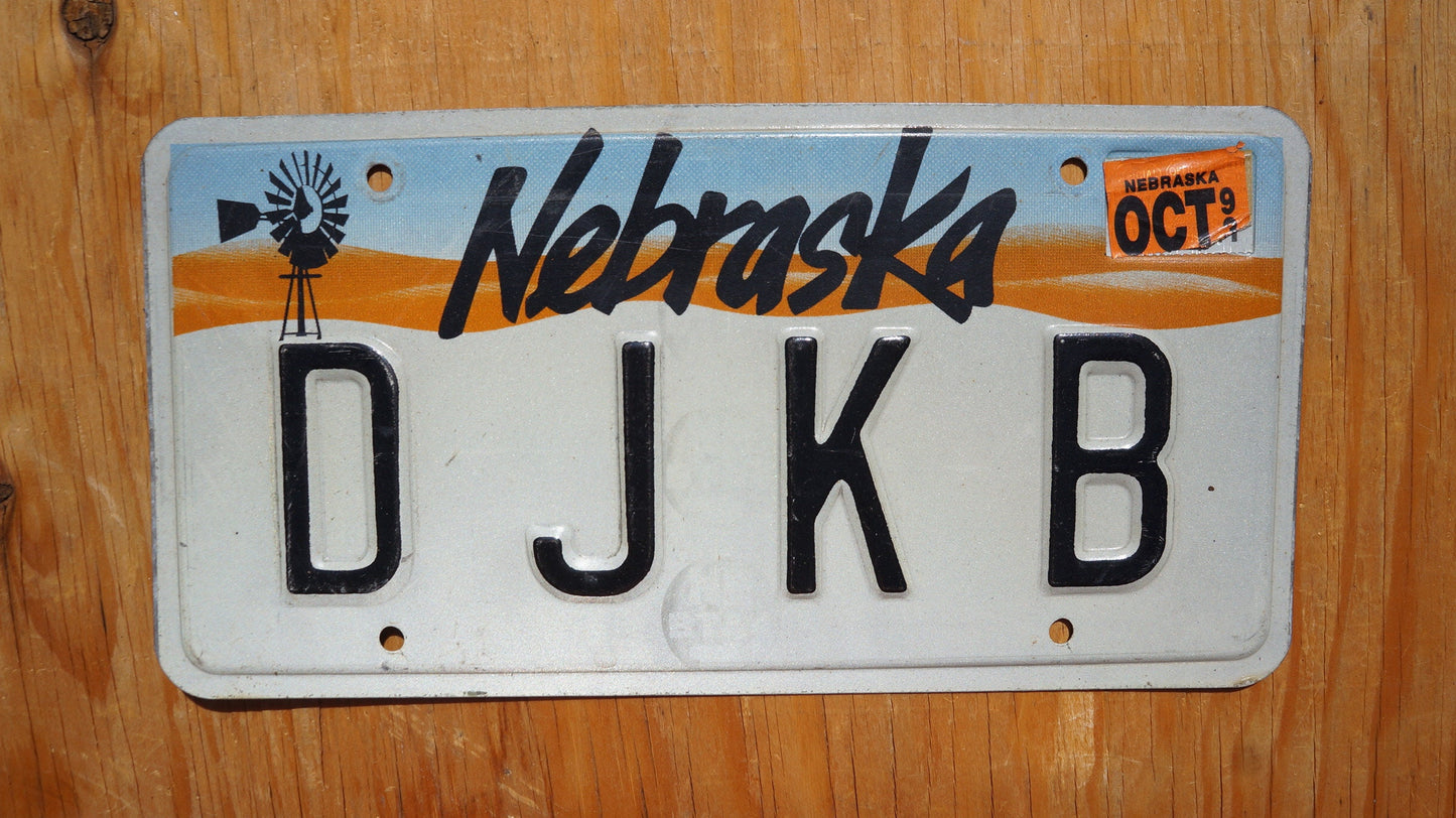 1990s  Nebraska Vanity WINDMILL License Plate # D J K B