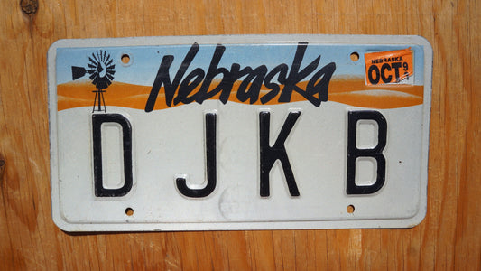 1990s  Nebraska Vanity WINDMILL License Plate # D J K B