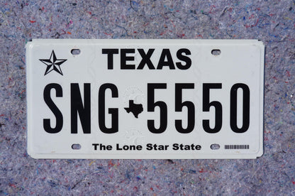 White Texas License Plate # SNG - 5550 The Lone Star State