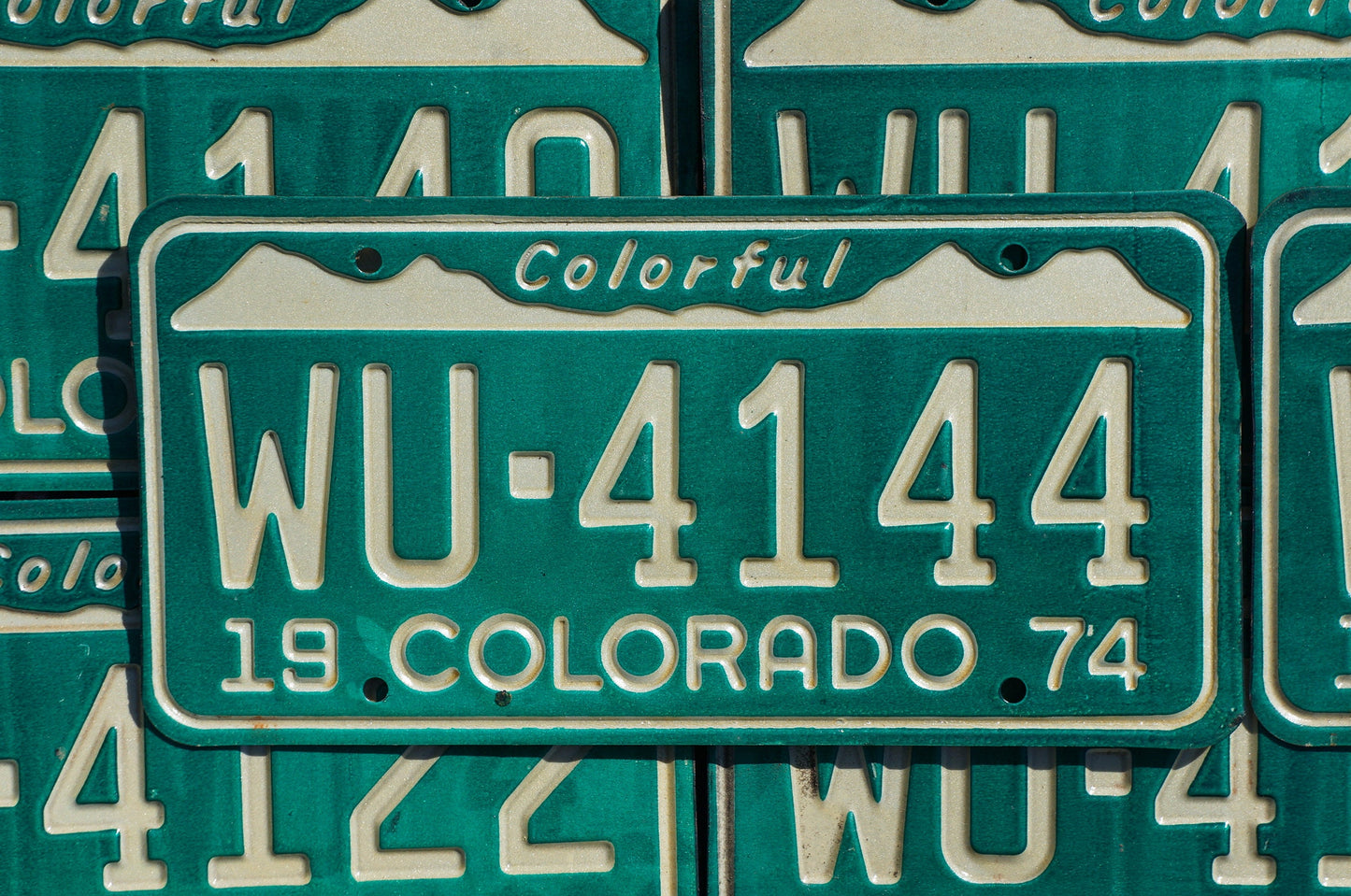 One or More - 1974 Colorful COLORADO SNOW MOUNTAINS Green License Plate