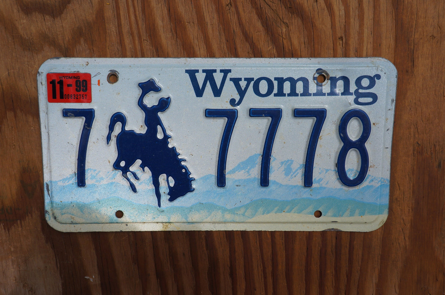 1999 Wyoming Cowboy Horse Blue License Plate # 7 - 7778