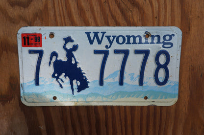 1999 Wyoming Cowboy Horse Blue License Plate # 7 - 7778