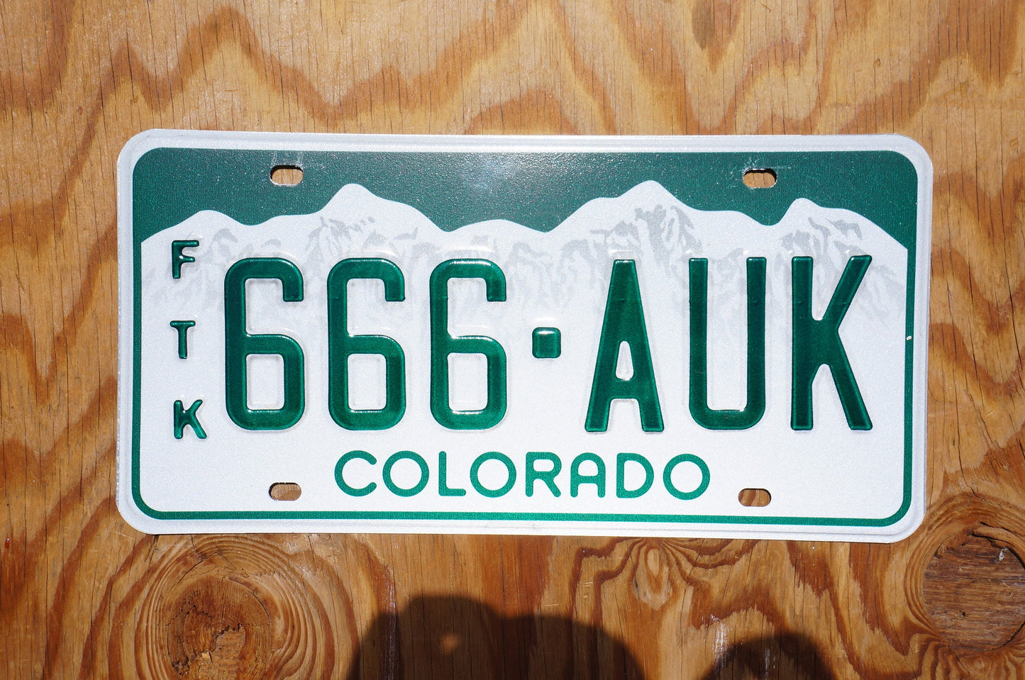 Colorado Snow Mountains Green License Plates # 666 - AUK