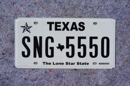 White Texas License Plate # SNG - 5550 The Lone Star State