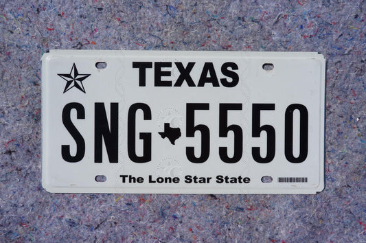 White Texas License Plate # SNG - 5550 The Lone Star State