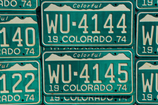 One or More - 1974 Colorful COLORADO SNOW MOUNTAINS Green License Plate