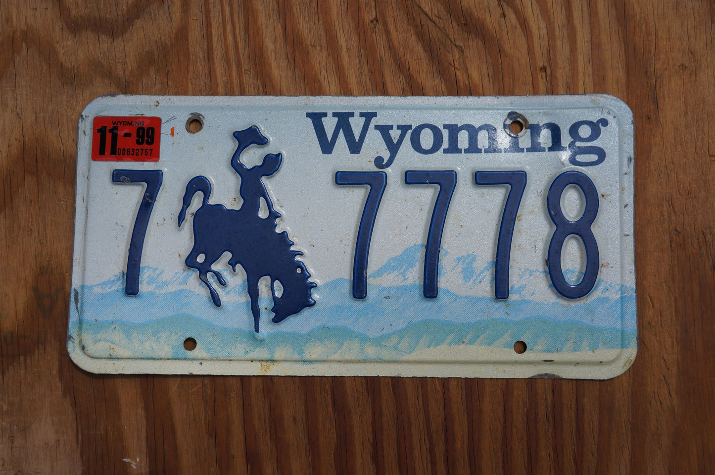 1999 Wyoming Cowboy Horse Blue License Plate # 7 - 7778