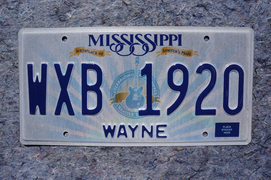 Mississippi Embossed Guitar License Plate # WXB 1920