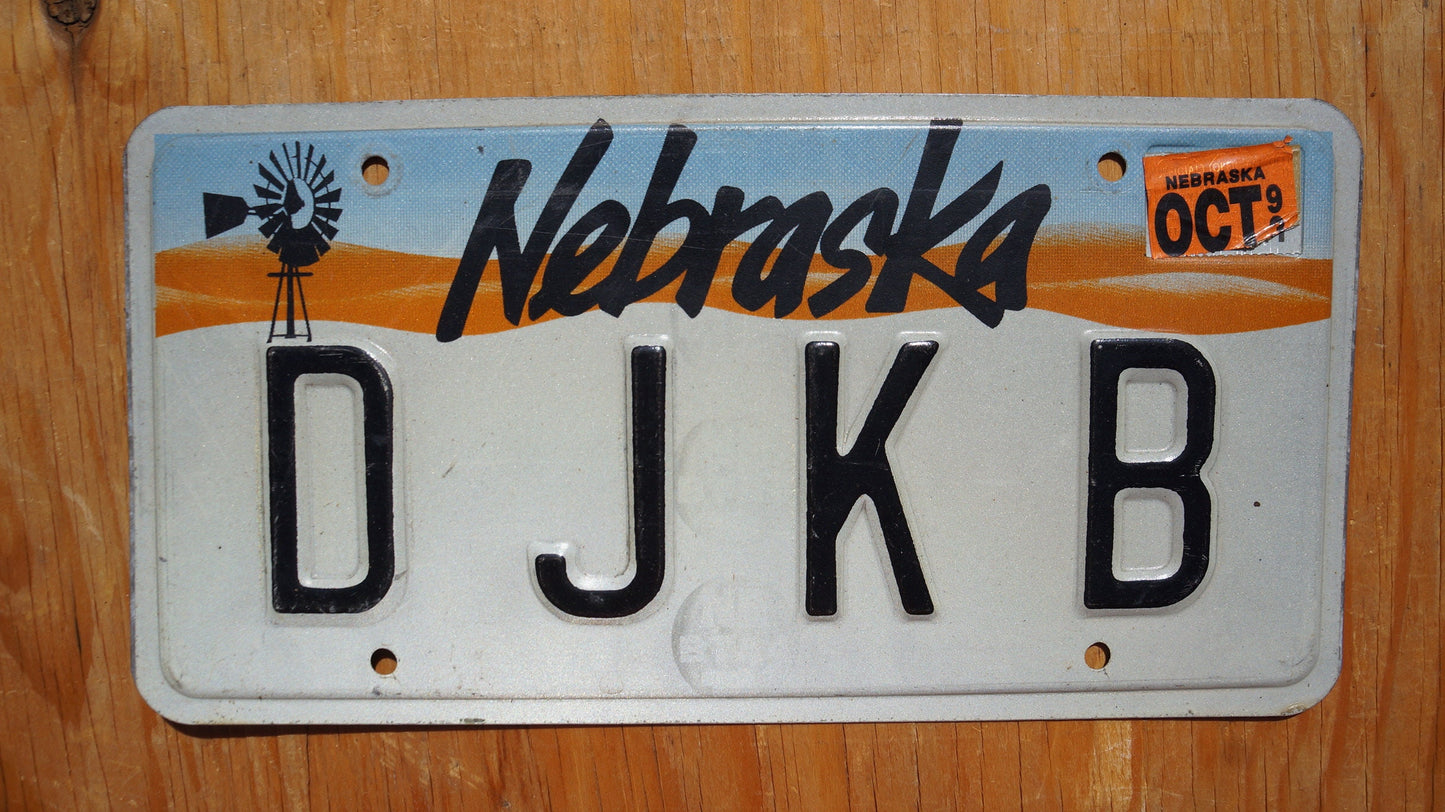 1990s  Nebraska Vanity WINDMILL License Plate # D J K B