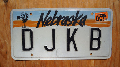 1990s  Nebraska Vanity WINDMILL License Plate # D J K B
