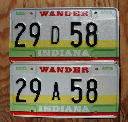 1980s Indiana Wander License Plate Pair: Yellow, Green, and Red Stripes