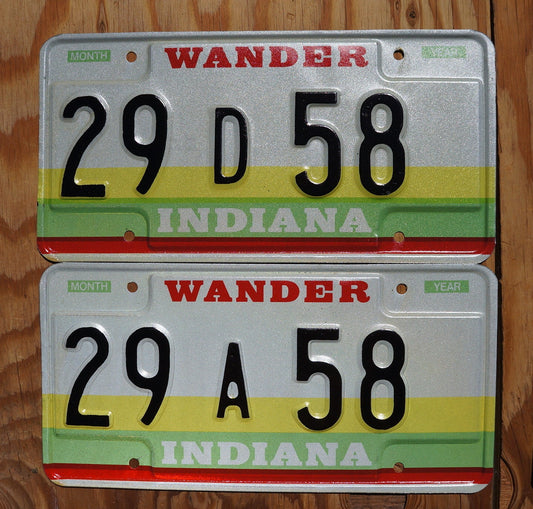 1980s Indiana Wander License Plate Pair: Yellow, Green, and Red Stripes
