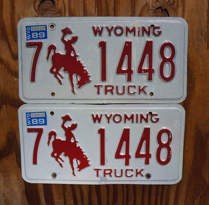 1989 Wyoming TRUCK Cowboy Horse Red License Plate Set / Pair # 1448
